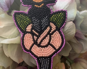 Caitlyn May, beadwork, beader, patches, jewelry, jewelry maker, Indigenous Artist, First Nations, Indigenous Arts Collective of Canada, Pass The Feather
