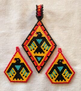 Beth Queau, crafts, beadwork, feathers, medicine bags, jewelry, pop sockets, keychains, purses, Indigenous Artist, First Nations, Indigenous Arts Collective of Canada, Pass The Feather